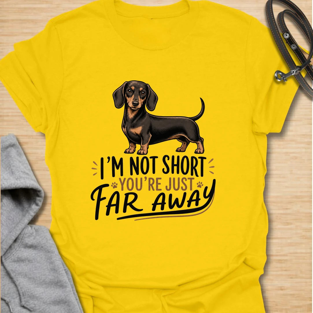 Funny dachshund t-shirt for anyone who knows sausage dogs are not short, everyone else is just far away. This cute design features a classic black and tan dachshund with bold playful lettering. A great gift for dachshund moms, dachshund dads, doxie lovers, wiener dog fans, and anyone who loves small dogs with big personality. Perfect for dog walks, casual weekends, breed meetups, or everyday dachshund-owner humor.