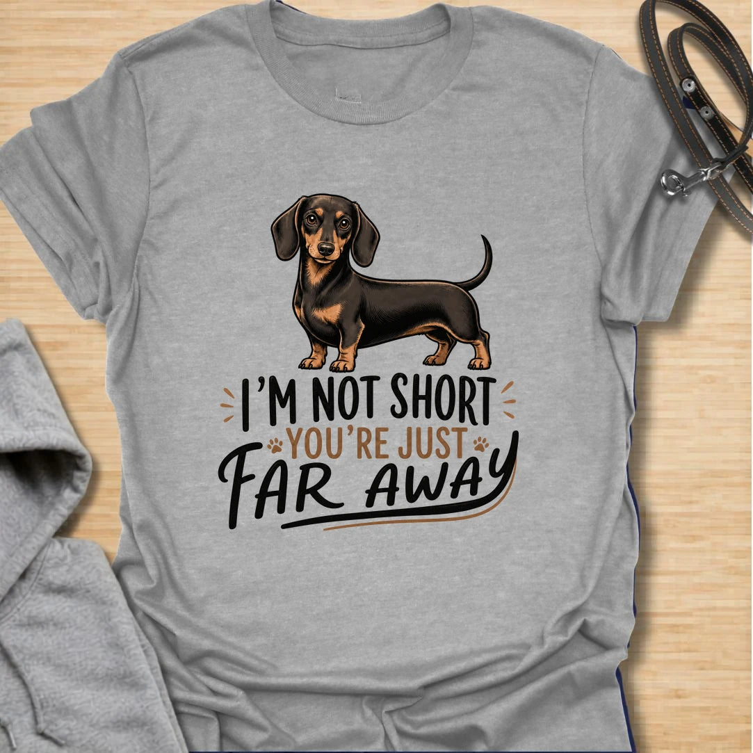 Funny dachshund t-shirt for anyone who knows sausage dogs are not short, everyone else is just far away. This cute design features a classic black and tan dachshund with bold playful lettering. A great gift for dachshund moms, dachshund dads, doxie lovers, wiener dog fans, and anyone who loves small dogs with big personality. Perfect for dog walks, casual weekends, breed meetups, or everyday dachshund-owner humor.