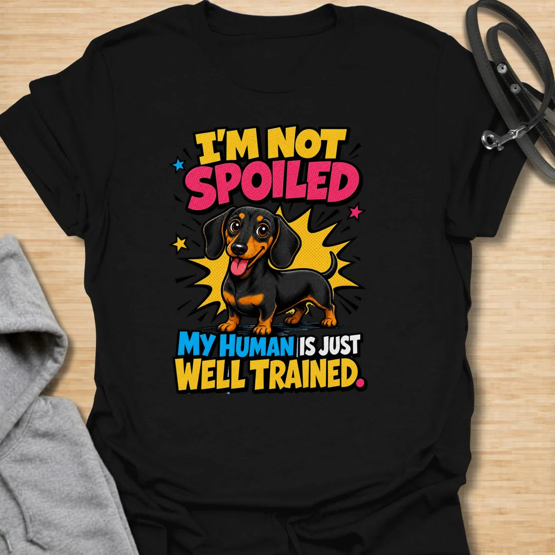 Not Spoiled Doxie t-shirt for dachshund owners who know their pup is not spoiled, the human is simply well trained. This bright comic-style design features a happy dachshund and the phrase “I’m Not Spoiled My Human Is Just Well Trained.” Perfect for doxie moms, sausage dog lovers, and anyone who treats their dog like royalty.