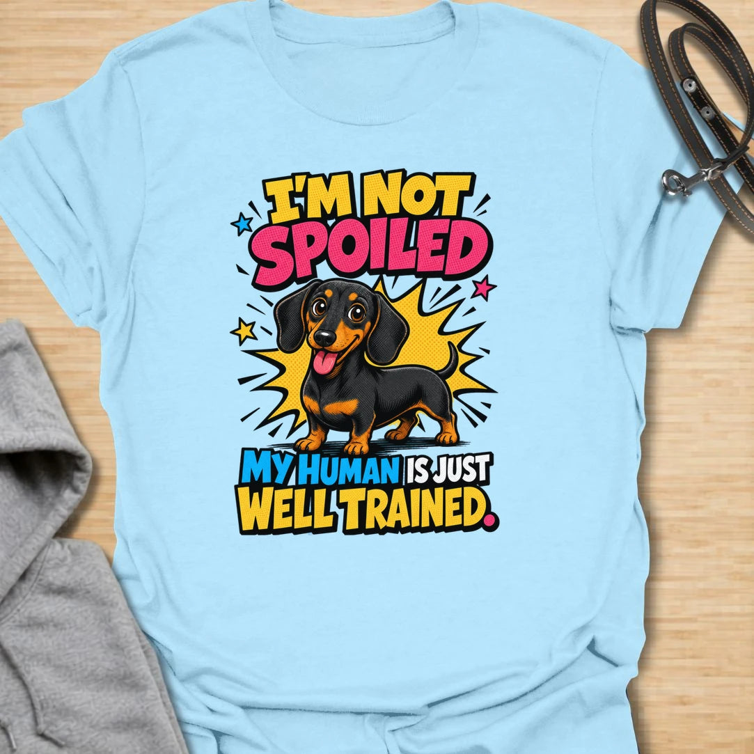 Not Spoiled Doxie t-shirt for dachshund owners who know their pup is not spoiled, the human is simply well trained. This bright comic-style design features a happy dachshund and the phrase “I’m Not Spoiled My Human Is Just Well Trained.” Perfect for doxie moms, sausage dog lovers, and anyone who treats their dog like royalty.