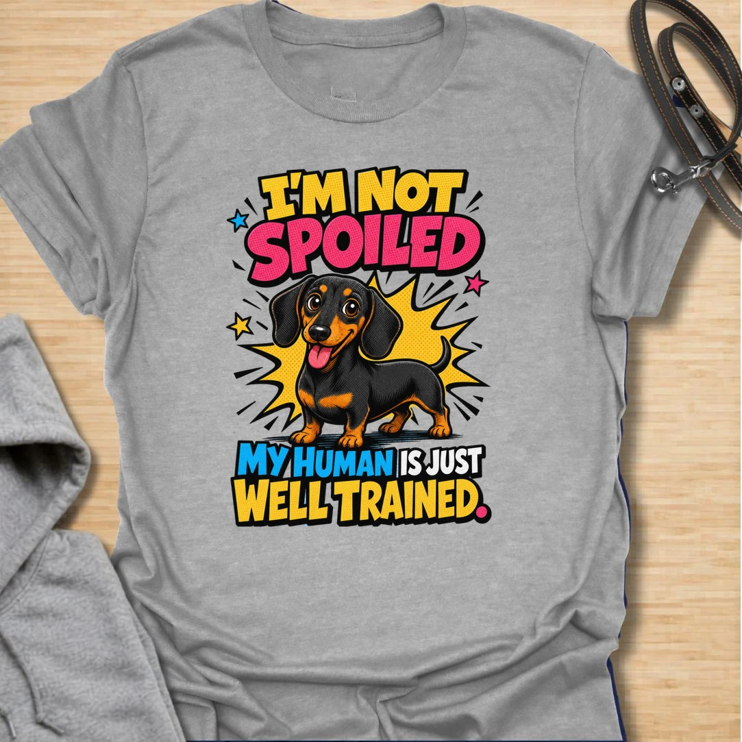 Not Spoiled Doxie t-shirt for dachshund owners who know their pup is not spoiled, the human is simply well trained. This bright comic-style design features a happy dachshund and the phrase “I’m Not Spoiled My Human Is Just Well Trained.” Perfect for doxie moms, sausage dog lovers, and anyone who treats their dog like royalty.