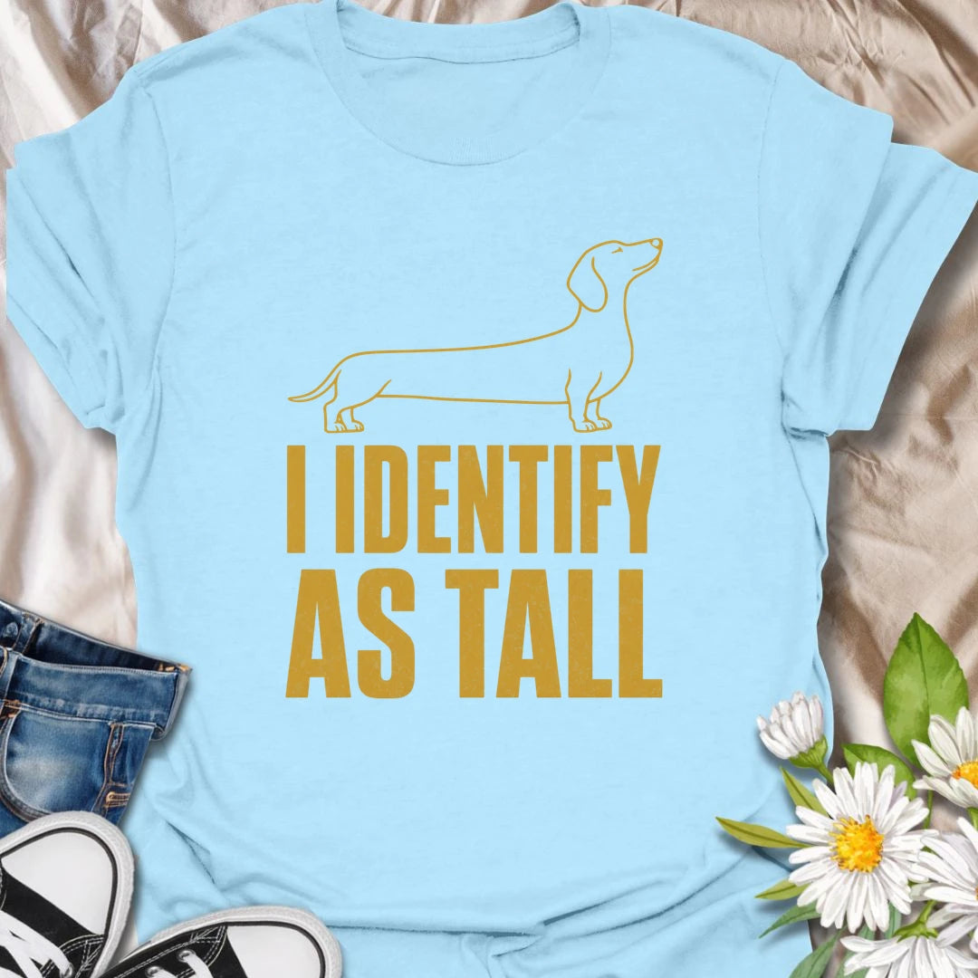 Short legs are merely a technical detail when your dachshund identifies as tall. This funny minimalist T-shirt celebrates the huge confidence packed into one long, low little dog. A clever gift for dachshund owners who love sausage dog attitude and breed-specific humor.