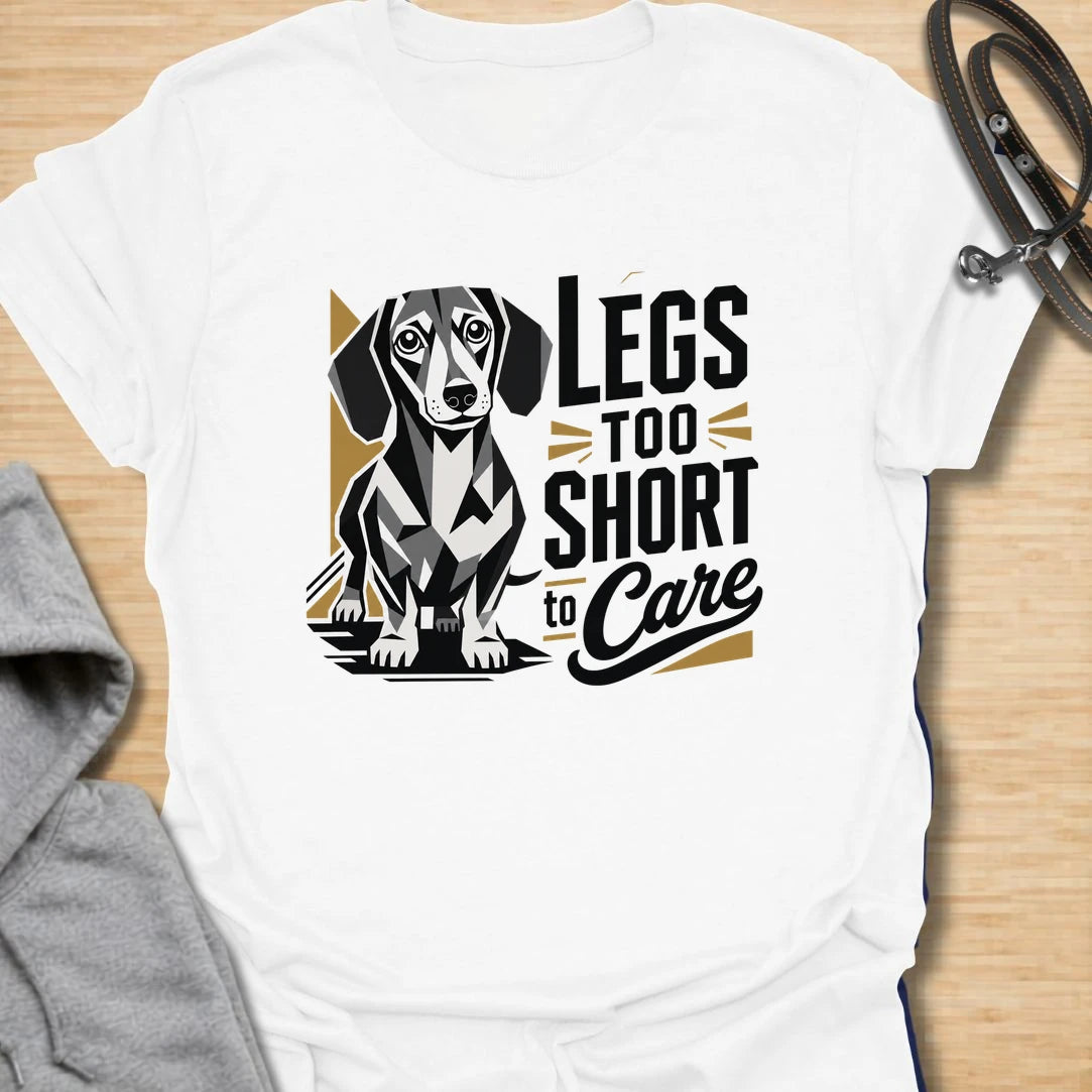 Legs Too Short To Care dachshund t-shirt for the wiener dog with zero worries and maximum charm. This funny design celebrates the classic dachshund build with bold lettering and a cute doxie illustration. It is a great choice for dachshund moms, doxie dads, and small dog lovers. Perfect for anyone who knows confidence has nothing to do with leg length.