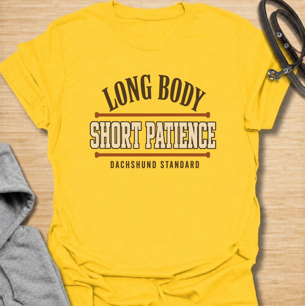 Long body, short patience. A bold dachshund T-shirt for sausage dog owners who understand the attitude packed into those tiny legs.