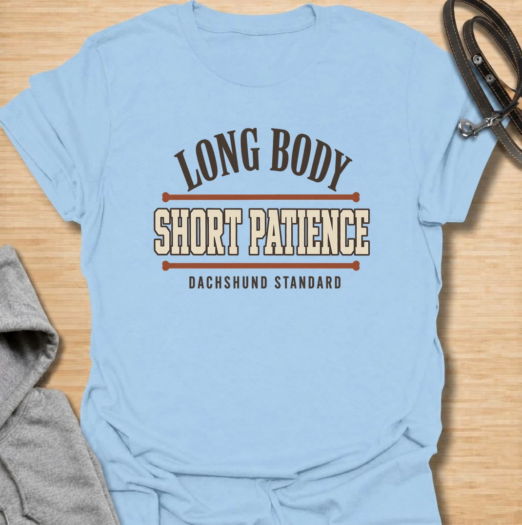 Long body, short patience. A bold dachshund T-shirt for sausage dog owners who understand the attitude packed into those tiny legs.