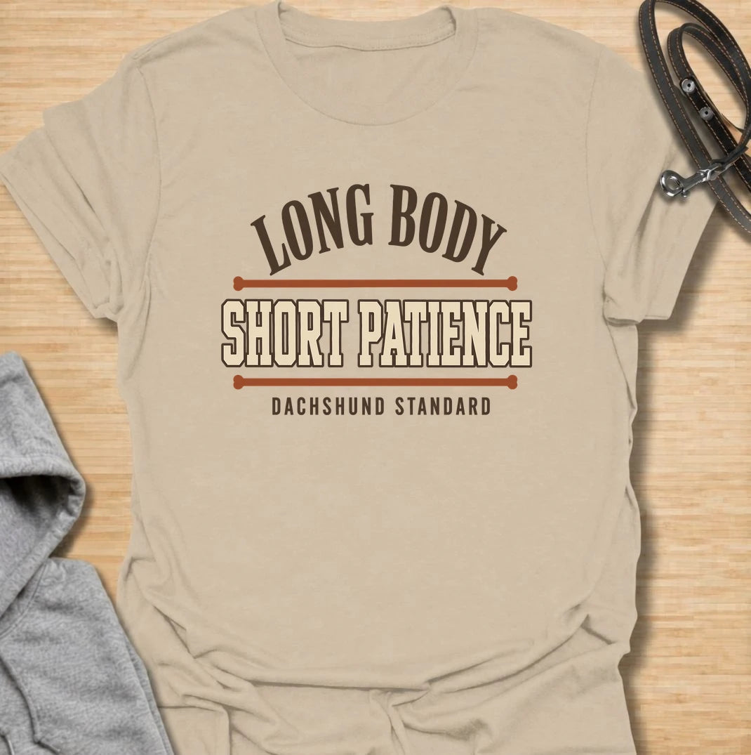 Long body, short patience. A bold dachshund T-shirt for sausage dog owners who understand the attitude packed into those tiny legs.