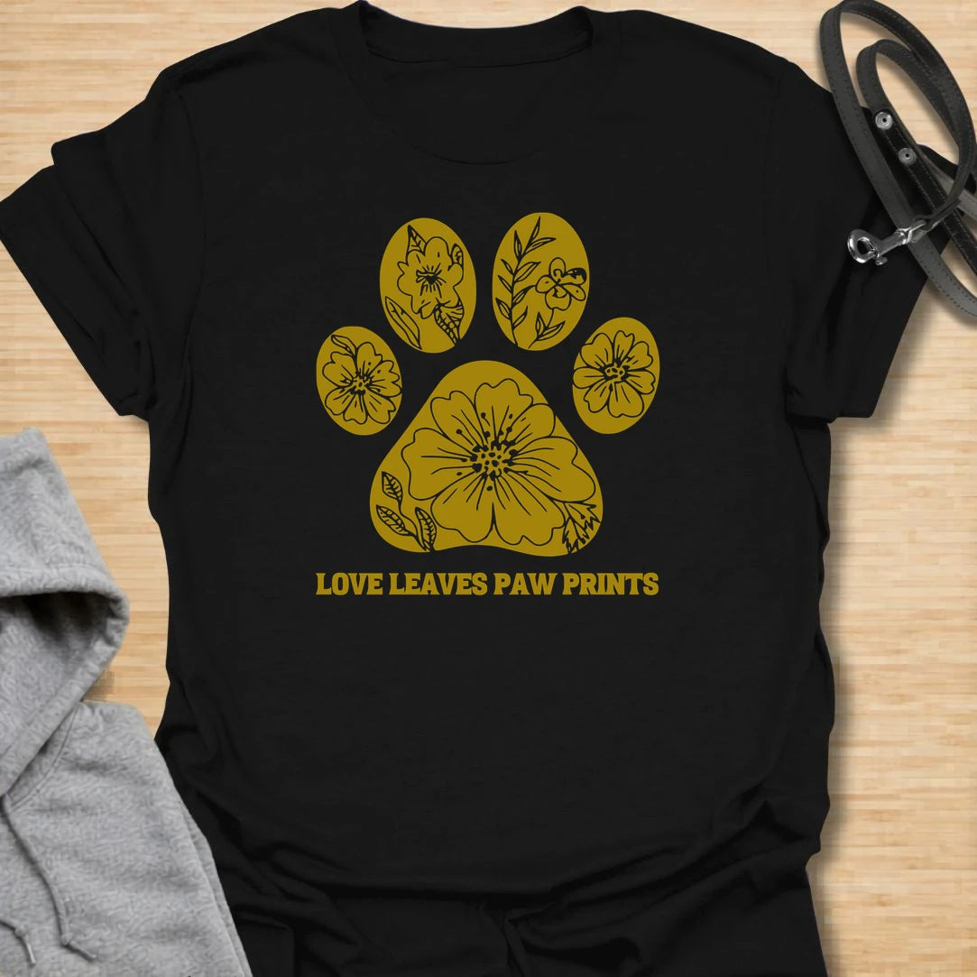 Love Leaves Pawprints t-shirt for dog lovers, pet parents, and animal lovers who know the bond with a dog stays in the heart forever. The floral paw print design gives this shirt a soft, meaningful look with a simple botanical feel. It is a lovely choice for dog moms, rescue dog families, and anyone who wants a gentle pet lover design. Perfect for everyday wear, thoughtful gifting, or honoring the special love shared with a beloved dog.