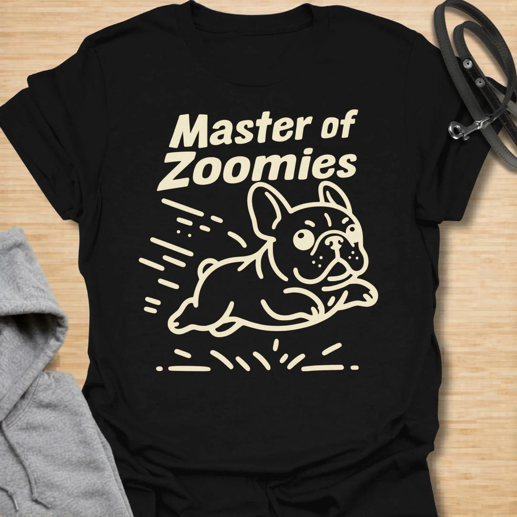 This Master Of Zoomies t-shirt is made for French Bulldog lovers who know their little dog can go from sleepy potato to full-speed chaos in seconds. Featuring a simple line-art Frenchie racing across the design with playful motion marks and bold text, this tee has a funny, energetic breed-specific feel. Perfect for Frenchie moms, Frenchie dads, French Bulldog owners, rescue dog lovers, and anyone whose small dog has sudden bursts of unstoppable zoomie energy.