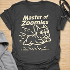 This Master Of Zoomies t-shirt is made for French Bulldog lovers who know their little dog can go from sleepy potato to full-speed chaos in seconds. Featuring a simple line-art Frenchie racing across the design with playful motion marks and bold text, this tee has a funny, energetic breed-specific feel. Perfect for Frenchie moms, Frenchie dads, French Bulldog owners, rescue dog lovers, and anyone whose small dog has sudden bursts of unstoppable zoomie energy.
