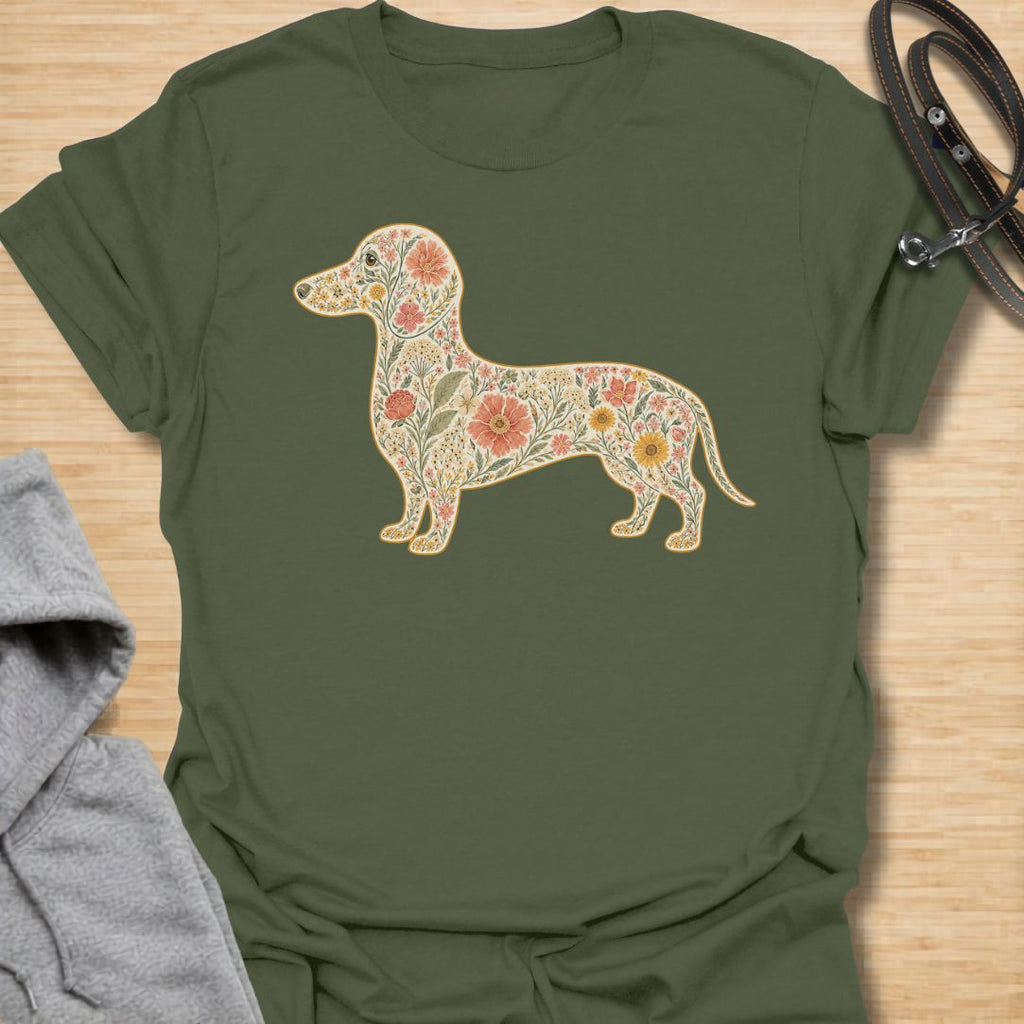 This Floral Dachshund t-shirt is made for doxie lovers who want a beautiful, botanical take on their favorite long dog. Featuring a dachshund silhouette filled with intricate flowers, leaves, vines, and vintage-style floral details, this design blends dog-lover charm with soft garden-inspired artwork. Perfect for dachshund moms, dachshund dads, wiener dog lovers, sausage dog fans, botanical art lovers, and anyone who loves both dogs and flowers.