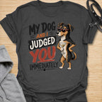 This My Dog And I Judged You Immediately t-shirt is made for dog lovers with a sarcastic sense of humor and a pup who notices everything. Featuring a sassy dachshund in sunglasses holding a cocktail, with bold retro lettering and attitude-packed styling, this design has a funny, confident dog-parent vibe. Perfect for dachshund moms, dachshund dads, dog lovers, rescue dog owners, pet parents, and anyone whose dog is just as judgmental as they are. Charcoal