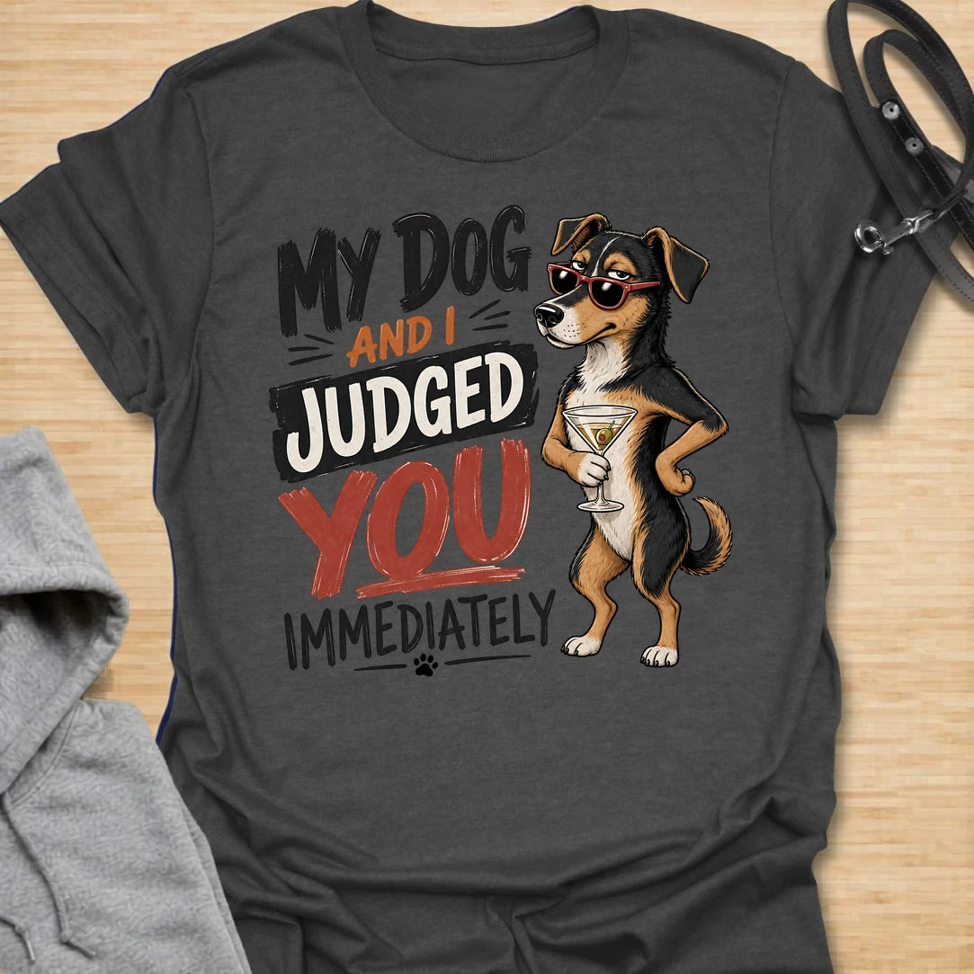 This My Dog And I Judged You Immediately t-shirt is made for dog lovers with a sarcastic sense of humor and a pup who notices everything. Featuring a sassy dachshund in sunglasses holding a cocktail, with bold retro lettering and attitude-packed styling, this design has a funny, confident dog-parent vibe. Perfect for dachshund moms, dachshund dads, dog lovers, rescue dog owners, pet parents, and anyone whose dog is just as judgmental as they are. Charcoal
