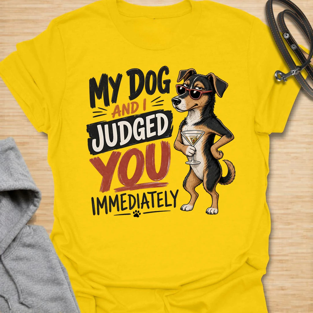 This My Dog And I Judged You Immediately t-shirt is made for dog lovers with a sarcastic sense of humor and a pup who notices everything. Featuring a sassy dachshund in sunglasses holding a cocktail, with bold retro lettering and attitude-packed styling, this design has a funny, confident dog-parent vibe. Perfect for dachshund moms, dachshund dads, dog lovers, rescue dog owners, pet parents, and anyone whose dog is just as judgmental as they are. Daisy