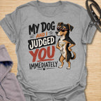 This My Dog And I Judged You Immediately t-shirt is made for dog lovers with a sarcastic sense of humor and a pup who notices everything. Featuring a sassy dachshund in sunglasses holding a cocktail, with bold retro lettering and attitude-packed styling, this design has a funny, confident dog-parent vibe. Perfect for dachshund moms, dachshund dads, dog lovers, rescue dog owners, pet parents, and anyone whose dog is just as judgmental as they are. Sport Grey