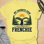 This My Favorite View Includes My Frenchie t-shirt is made for French Bulldog lovers who know every beautiful view is better with their little dog beside them. Featuring a scenic outdoor badge with mountains, pine trees, a sunset, and a seated Frenchie silhouette, this design has a warm adventure-inspired feel with breed-specific charm. Perfect for Frenchie moms, Frenchie dads, French Bulldog owners, outdoor dog lovers, hikers, campers, and anyone whose favorite view always includes their dog.