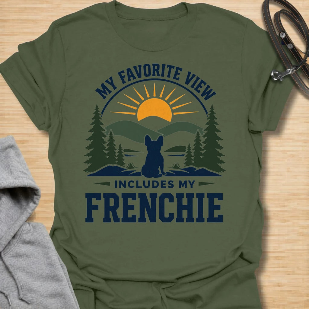 This My Favorite View Includes My Frenchie t-shirt is made for French Bulldog lovers who know every beautiful view is better with their little dog beside them. Featuring a scenic outdoor badge with mountains, pine trees, a sunset, and a seated Frenchie silhouette, this design has a warm adventure-inspired feel with breed-specific charm. Perfect for Frenchie moms, Frenchie dads, French Bulldog owners, outdoor dog lovers, hikers, campers, and anyone whose favorite view always includes their dog.