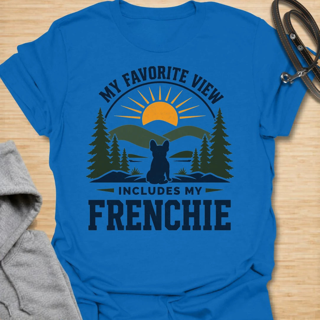 This My Favorite View Includes My Frenchie t-shirt is made for French Bulldog lovers who know every beautiful view is better with their little dog beside them. Featuring a scenic outdoor badge with mountains, pine trees, a sunset, and a seated Frenchie silhouette, this design has a warm adventure-inspired feel with breed-specific charm. Perfect for Frenchie moms, Frenchie dads, French Bulldog owners, outdoor dog lovers, hikers, campers, and anyone whose favorite view always includes their dog.