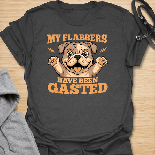 This My Flabbers Have Been Gasted t-shirt is made for dog lovers who enjoy silly wordplay, dramatic dogs, and big surprised puppy energy. Featuring a wide-eyed cartoon dog with raised paws, bold retro lettering, and a funny “flabbergasted” joke, this design has a playful dog-humor feel that is easy to wear. Perfect for dog moms, dog dads, rescue dog owners, pet parents, and anyone who loves goofy dogs with over-the-top reactions.