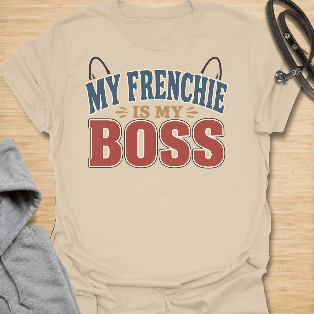 This My Frenchie Is My Boss t-shirt is made for French Bulldog lovers who know exactly who runs the house. Featuring bold varsity-style lettering, playful Frenchie ear details, and a funny dog-parent message, this simple design has a confident breed-specific feel that Frenchie owners will instantly understand. Perfect for Frenchie moms, Frenchie dads, French Bulldog owners, rescue dog lovers, and anyone whose small dog has very big authority.