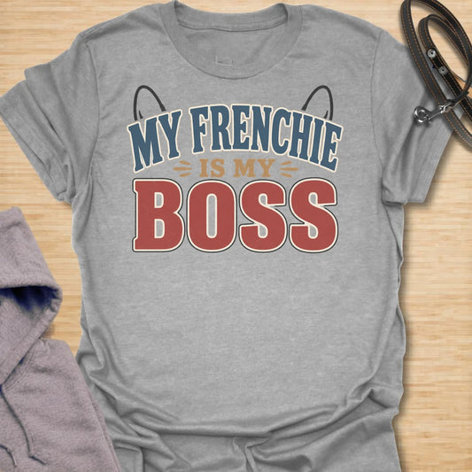 This My Frenchie Is My Boss t-shirt is made for French Bulldog lovers who know exactly who runs the house. Featuring bold varsity-style lettering, playful Frenchie ear details, and a funny dog-parent message, this simple design has a confident breed-specific feel that Frenchie owners will instantly understand. Perfect for Frenchie moms, Frenchie dads, French Bulldog owners, rescue dog lovers, and anyone whose small dog has very big authority.