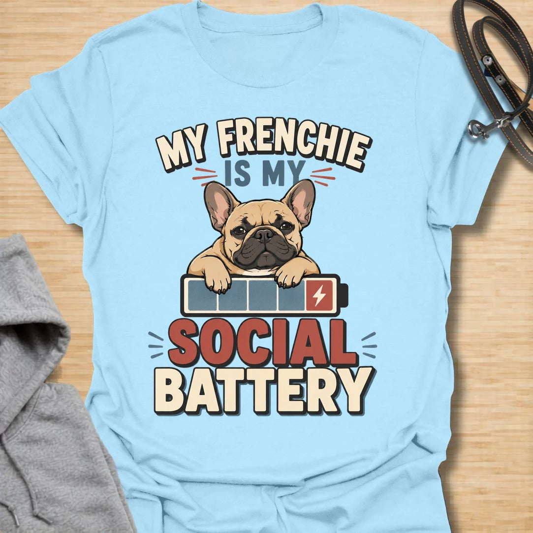 This My Frenchie Is My Social Battery t-shirt is made for French Bulldog lovers who know their little dog is the only social support they need. Featuring a tired Frenchie resting on a battery graphic with bold retro lettering, this design has a funny, relatable feel for introverted dog parents and Frenchie fans. Perfect for Frenchie moms, Frenchie dads, French Bulldog owners, rescue dog lovers, and anyone whose social battery is powered by their dog.