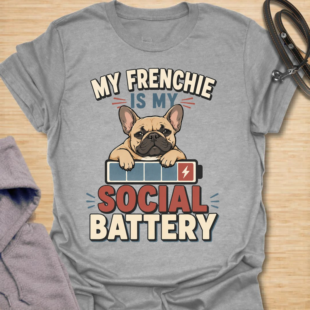 This My Frenchie Is My Social Battery t-shirt is made for French Bulldog lovers who know their little dog is the only social support they need. Featuring a tired Frenchie resting on a battery graphic with bold retro lettering, this design has a funny, relatable feel for introverted dog parents and Frenchie fans. Perfect for Frenchie moms, Frenchie dads, French Bulldog owners, rescue dog lovers, and anyone whose social battery is powered by their dog.