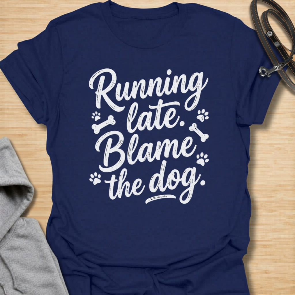 Funny dog lover t-shirt featuring the phrase “Running late. Blame the dog.” A perfect tee for dog moms, dog dads, rescue dog owners, and pet parents who know dogs always come first.