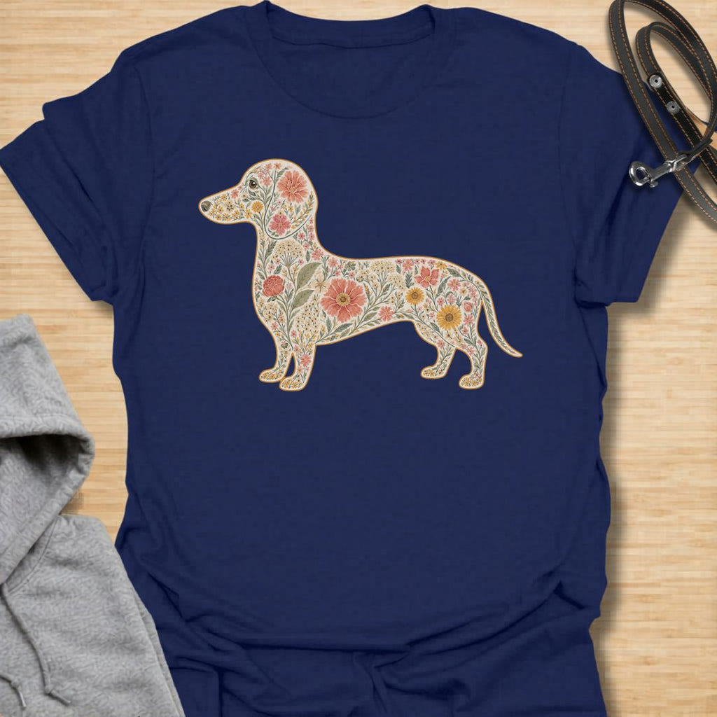 This Floral Dachshund t-shirt is made for doxie lovers who want a beautiful, botanical take on their favorite long dog. Featuring a dachshund silhouette filled with intricate flowers, leaves, vines, and vintage-style floral details, this design blends dog-lover charm with soft garden-inspired artwork. Perfect for dachshund moms, dachshund dads, wiener dog lovers, sausage dog fans, botanical art lovers, and anyone who loves both dogs and flowers.