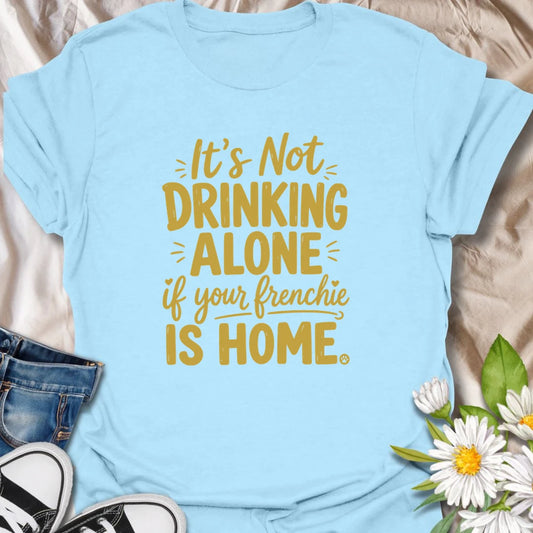 It is never really drinking alone when your Frenchie is home keeping you company. This funny French Bulldog T-shirt is perfect for relaxing evenings, casual gatherings, and devoted bulldog owners. A playful gift for Frenchie moms, dads, and dog lovers with a loyal drinking buddy.