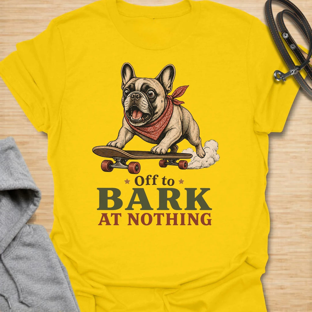 This Off To Bark At Nothing t-shirt is made for French Bulldog lovers who know their little dog can find a reason to bark at absolutely anything. Featuring a playful Frenchie riding a skateboard with a red bandana, bold retro lettering, and a funny chaotic-dog message, this design has a fun breed-specific feel with plenty of attitude. Perfect for Frenchie moms, Frenchie dads, French Bulldog owners, rescue dog lovers, and anyone whose small dog is always off to make noise for no reason. Daisy