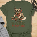 This Off To Bark At Nothing t-shirt is made for French Bulldog lovers who know their little dog can find a reason to bark at absolutely anything. Featuring a playful Frenchie riding a skateboard with a red bandana, bold retro lettering, and a funny chaotic-dog message, this design has a fun breed-specific feel with plenty of attitude. Perfect for Frenchie moms, Frenchie dads, French Bulldog owners, rescue dog lovers, and anyone whose small dog is always off to make noise for no reason. Military Green