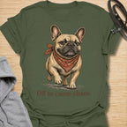 This Off to Cause Chaos French Bulldog t-shirt is perfect for dog lovers who know Frenchies are small, stubborn, adorable, and always up to something. Featuring a confident vintage-style French Bulldog illustration with a red bandana and the playful phrase “Off to cause chaos,” this design captures the mischievous, funny personality the breed is known for. A great gift for French Bulldog moms, Frenchie dads, dog owners, pet lovers, and anyone obsessed with their little chaos gremlin. Military Green