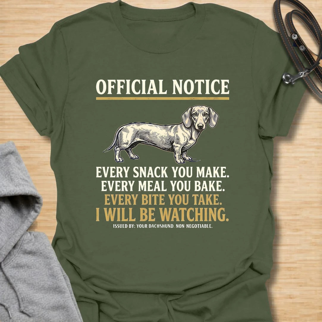 This Official Notice dachshund t-shirt is made for doxie lovers who know their little long dog is always watching when food is involved. Featuring a vintage-style dachshund illustration with bold notice-style typography and the funny phrase Every Snack You Make, Every Meal You Bake, Every Bite You Take, I Will Be Watching, this design has a playful dog-parent feel that wiener dog fans will instantly understand. Perfect for dachshund moms, dachshund dads, snack-sharing dog owners, rescue dog lovers, and anyo