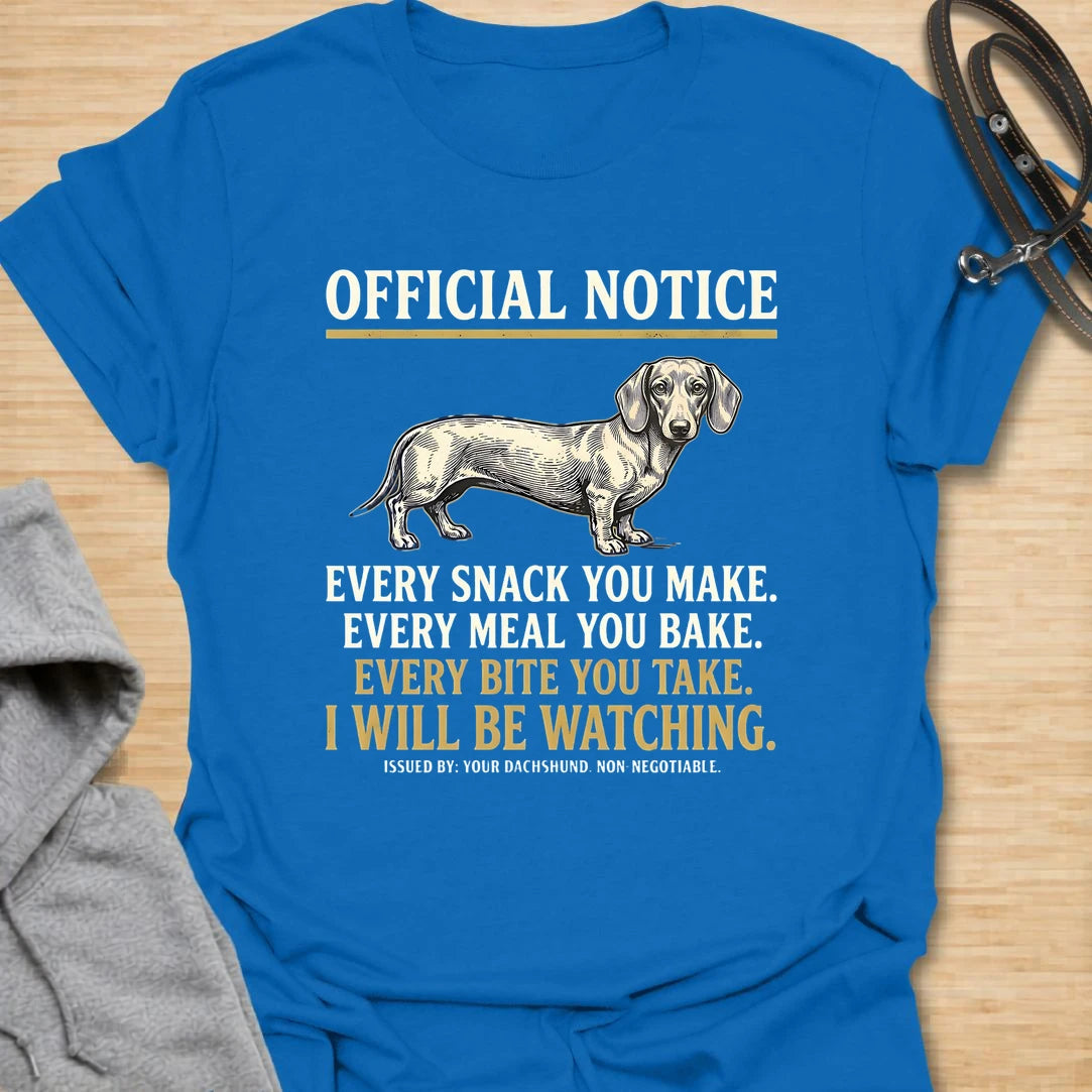 This Official Notice dachshund t-shirt is made for doxie lovers who know their little long dog is always watching when food is involved. Featuring a vintage-style dachshund illustration with bold notice-style typography and the funny phrase Every Snack You Make, Every Meal You Bake, Every Bite You Take, I Will Be Watching, this design has a playful dog-parent feel that wiener dog fans will instantly understand. Perfect for dachshund moms, dachshund dads, snack-sharing dog owners, rescue dog lovers, and anyo