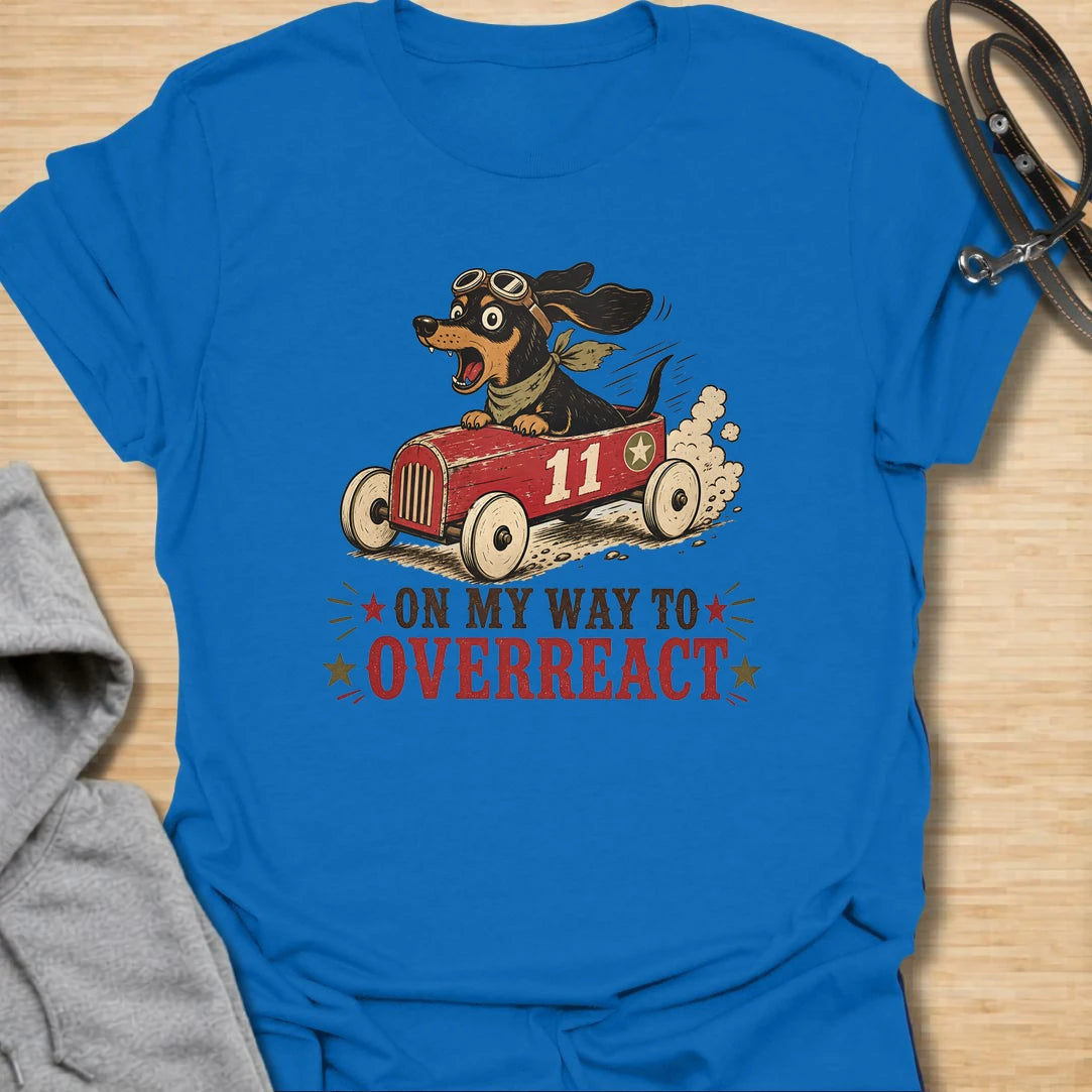 On My Way to Overreact t-shirt for dachshund lovers who know their little dog brings maximum drama to every situation. This funny vintage design features a chaotic wiener dog speeding along in a red racer car with bold retro lettering and classic doxie personality. Perfect for dachshund moms, doxie dads, sausage dog owners, and anyone who loves dramatic little dogs with big opinions.