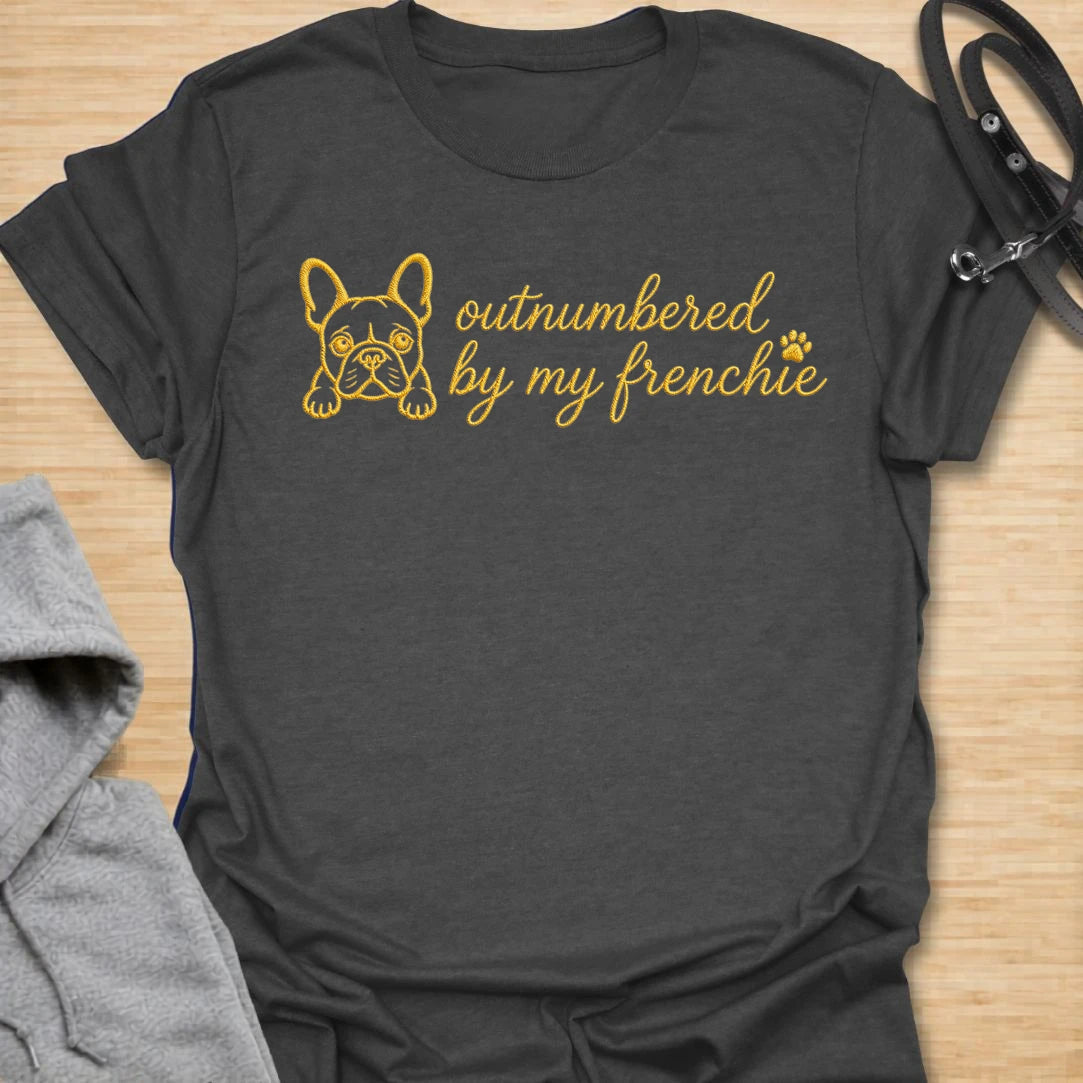 This Outnumbered By My Frenchie faux embroidery t-shirt is made for French Bulldog lovers who know their little dog may be small, but somehow takes up the whole house. Featuring a simple Frenchie line-art face with paw print detail and playful script text, this cute breed-specific design is great for Frenchie moms, Frenchie dads, French Bulldog owners, rescue dog lovers, and anyone completely ruled by their Frenchie.