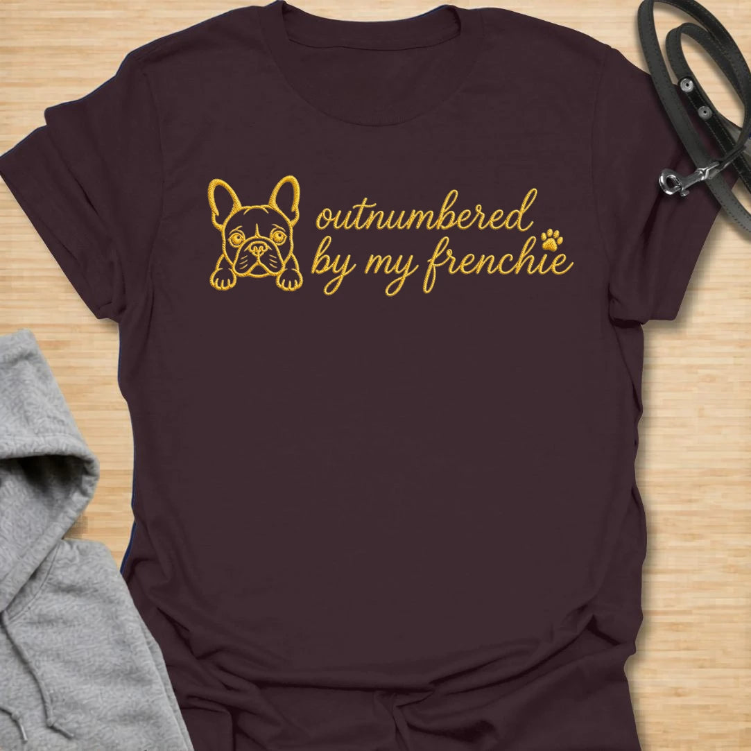 This Outnumbered By My Frenchie faux embroidery t-shirt is made for French Bulldog lovers who know their little dog may be small, but somehow takes up the whole house. Featuring a simple Frenchie line-art face with paw print detail and playful script text, this cute breed-specific design is great for Frenchie moms, Frenchie dads, French Bulldog owners, rescue dog lovers, and anyone completely ruled by their Frenchie.