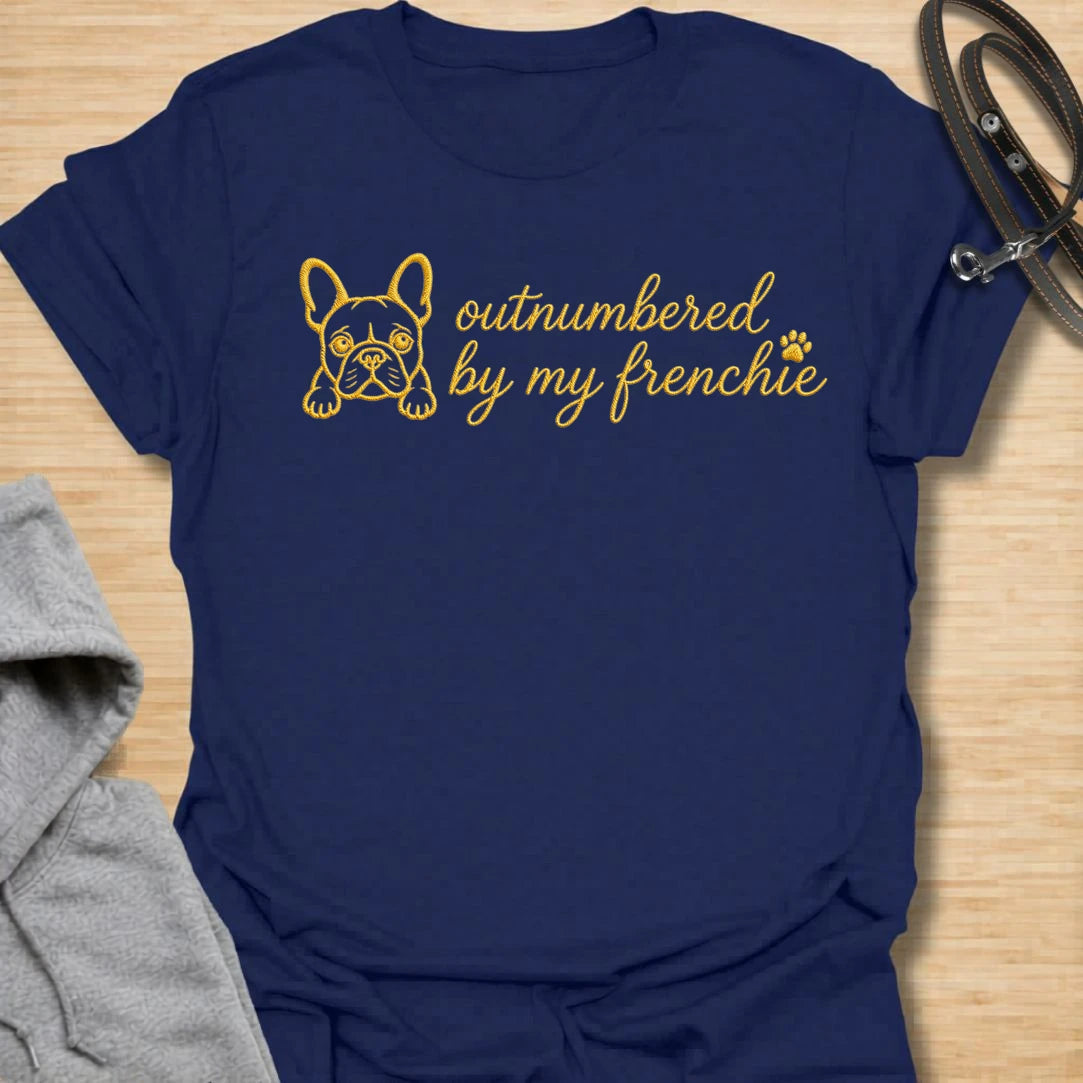 This Outnumbered By My Frenchie faux embroidery t-shirt is made for French Bulldog lovers who know their little dog may be small, but somehow takes up the whole house. Featuring a simple Frenchie line-art face with paw print detail and playful script text, this cute breed-specific design is great for Frenchie moms, Frenchie dads, French Bulldog owners, rescue dog lovers, and anyone completely ruled by their Frenchie.