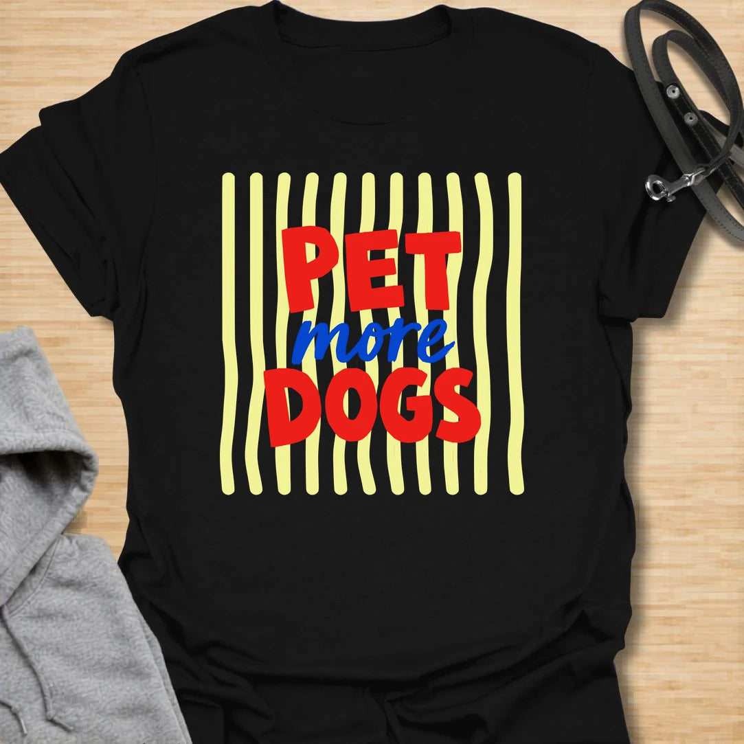 This pet more dogs t-shirt is bright, simple, and perfect for people who believe every day needs more dogs. The bold red and blue lettering gives the design a playful retro feel that is easy to read and fun to wear. It is a great choice for dog moms, dog dads, rescue supporters, groomers, walkers, and anyone who stops to pet every dog they meet. A cheerful everyday dog lover shirt with a clear message and plenty of personality.
