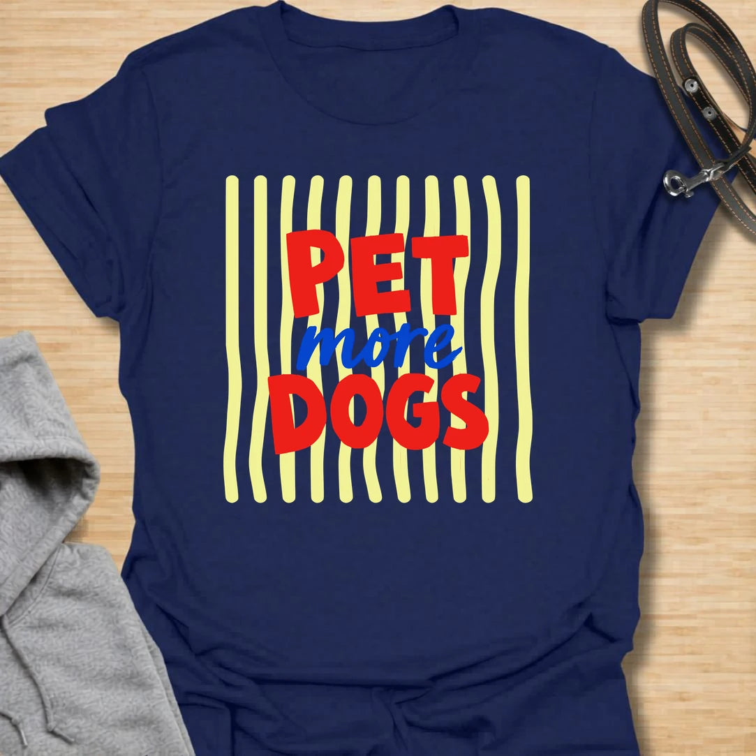 This pet more dogs t-shirt is bright, simple, and perfect for people who believe every day needs more dogs. The bold red and blue lettering gives the design a playful retro feel that is easy to read and fun to wear. It is a great choice for dog moms, dog dads, rescue supporters, groomers, walkers, and anyone who stops to pet every dog they meet. A cheerful everyday dog lover shirt with a clear message and plenty of personality.