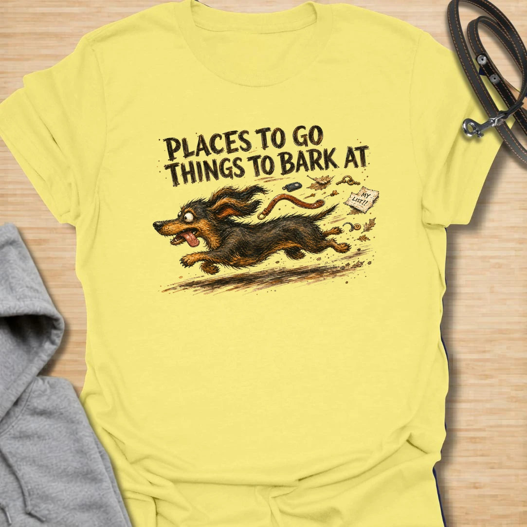 A chaotic dachshund T-shirt for little dogs with busy schedules and plenty of opinions. The energetic artwork captures a determined sausage dog racing toward its next completely unnecessary barking appointment. A funny gift for dachshund moms, dachshund dads, and anyone living with a tiny four-legged troublemaker.