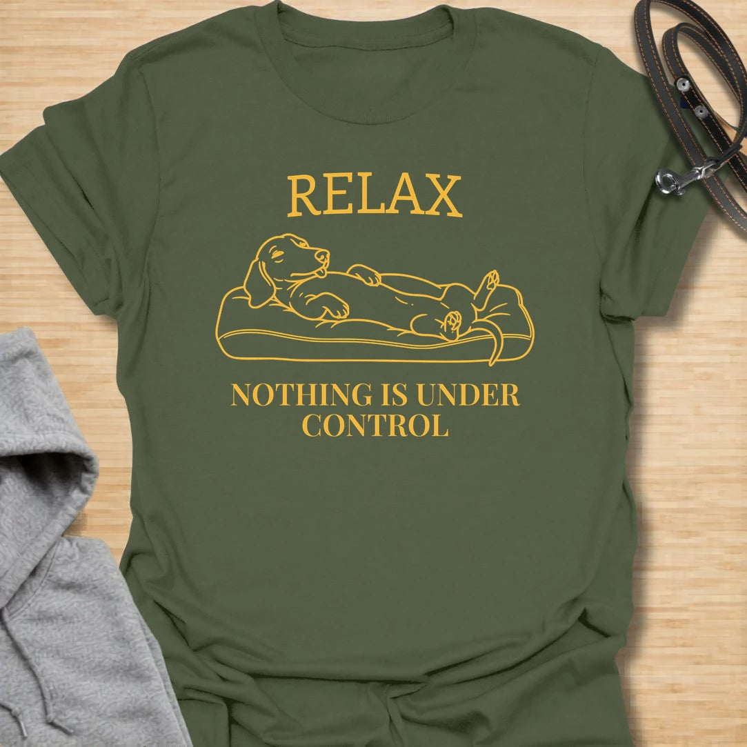 This Relax Nothing Is Under Control t-shirt is made for dachshund lovers who know life with a doxie is rarely calm, but always worth it. Featuring a relaxed dachshund lying on a couch with simple line-art styling and bold text, this design has a funny, laid-back dog-parent feel that wiener dog fans will instantly understand. Perfect for dachshund moms, dachshund dads, rescue dog lovers, introverts, and anyone whose small dog has turned chaos into a lifestyle.