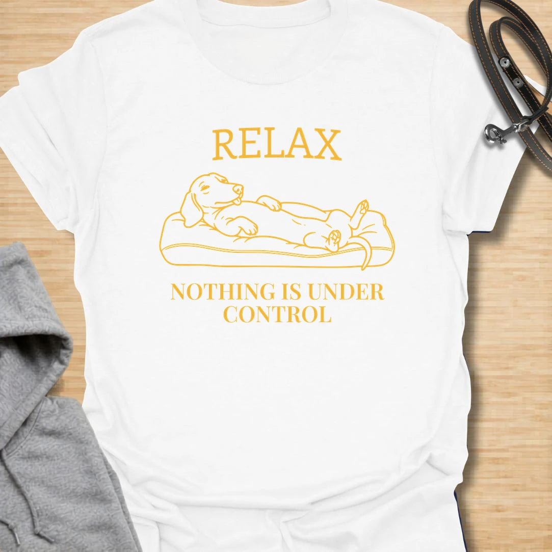 This Relax Nothing Is Under Control t-shirt is made for dachshund lovers who know life with a doxie is rarely calm, but always worth it. Featuring a relaxed dachshund lying on a couch with simple line-art styling and bold text, this design has a funny, laid-back dog-parent feel that wiener dog fans will instantly understand. Perfect for dachshund moms, dachshund dads, rescue dog lovers, introverts, and anyone whose small dog has turned chaos into a lifestyle.