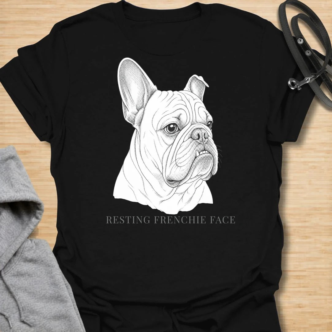 This Resting Frenchie Face t-shirt is made for French Bulldog lovers who know their little dog’s serious expression says everything. Featuring a detailed line-art Frenchie portrait with a funny breed-specific phrase, this simple dog design is great for Frenchie moms, Frenchie dads, French Bulldog owners, rescue dog lovers, and anyone who loves the classic Frenchie side-eye look.