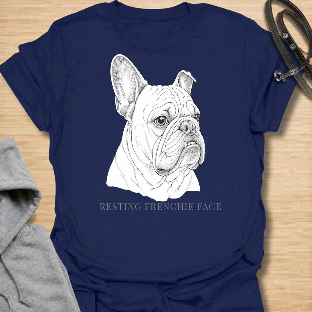 This Resting Frenchie Face t-shirt is made for French Bulldog lovers who know their little dog’s serious expression says everything. Featuring a detailed line-art Frenchie portrait with a funny breed-specific phrase, this simple dog design is great for Frenchie moms, Frenchie dads, French Bulldog owners, rescue dog lovers, and anyone who loves the classic Frenchie side-eye look.