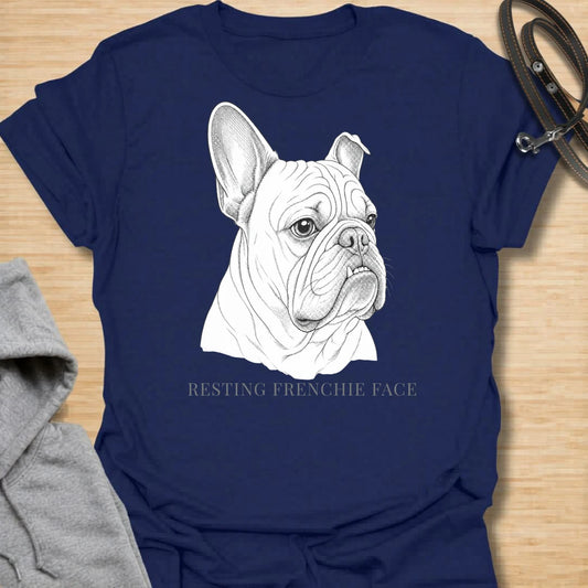 This Resting Frenchie Face t-shirt is made for French Bulldog lovers who know their little dog’s serious expression says everything. Featuring a detailed line-art Frenchie portrait with a funny breed-specific phrase, this simple dog design is great for Frenchie moms, Frenchie dads, French Bulldog owners, rescue dog lovers, and anyone who loves the classic Frenchie side-eye look.