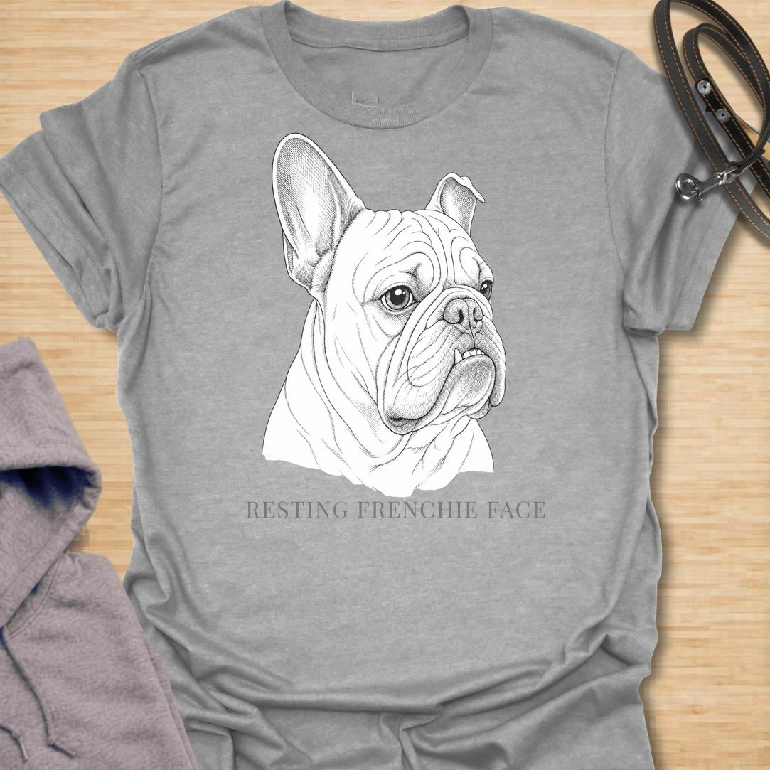 This Resting Frenchie Face t-shirt is made for French Bulldog lovers who know their little dog’s serious expression says everything. Featuring a detailed line-art Frenchie portrait with a funny breed-specific phrase, this simple dog design is great for Frenchie moms, Frenchie dads, French Bulldog owners, rescue dog lovers, and anyone who loves the classic Frenchie side-eye look.