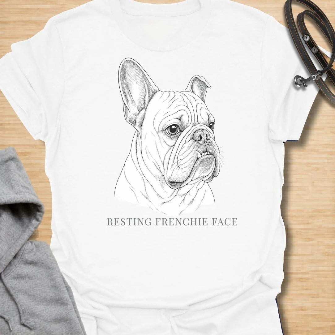 This Resting Frenchie Face t-shirt is made for French Bulldog lovers who know their little dog’s serious expression says everything. Featuring a detailed line-art Frenchie portrait with a funny breed-specific phrase, this simple dog design is great for Frenchie moms, Frenchie dads, French Bulldog owners, rescue dog lovers, and anyone who loves the classic Frenchie side-eye look.