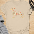 This Floral Dachshund t-shirt is made for doxie lovers who want a beautiful, botanical take on their favorite long dog. Featuring a dachshund silhouette filled with intricate flowers, leaves, vines, and vintage-style floral details, this design blends dog-lover charm with soft garden-inspired artwork. Perfect for dachshund moms, dachshund dads, wiener dog lovers, sausage dog fans, botanical art lovers, and anyone who loves both dogs and flowers.