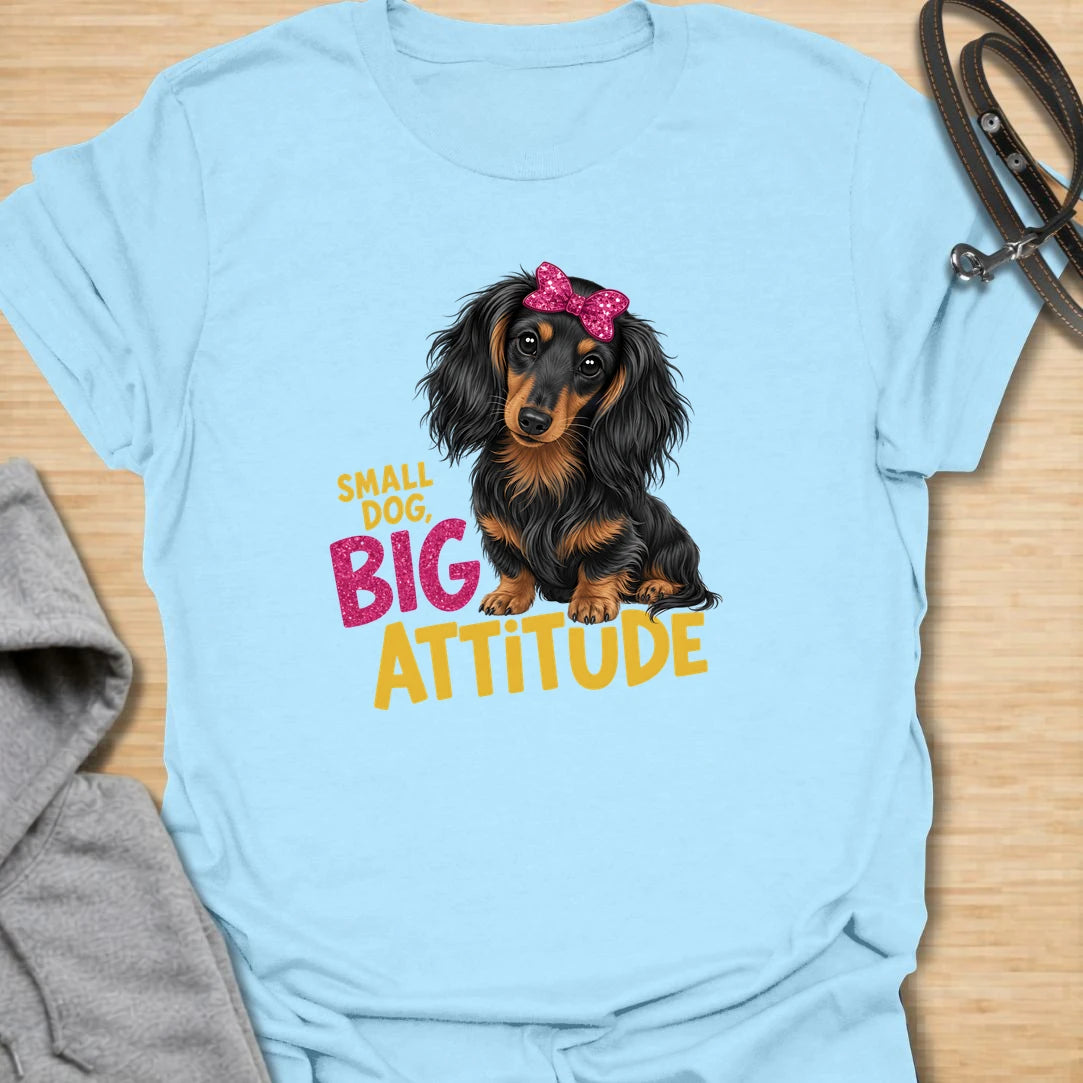 Small Dog Attitude t-shirt for dachshund lovers who know tiny legs can come with a very big personality. This cute long-haired dachshund design features a bright bow and the phrase “Small Dog, Big Attitude.” Perfect for doxie moms, small dog owners, and anyone who loves a sassy sausage dog.